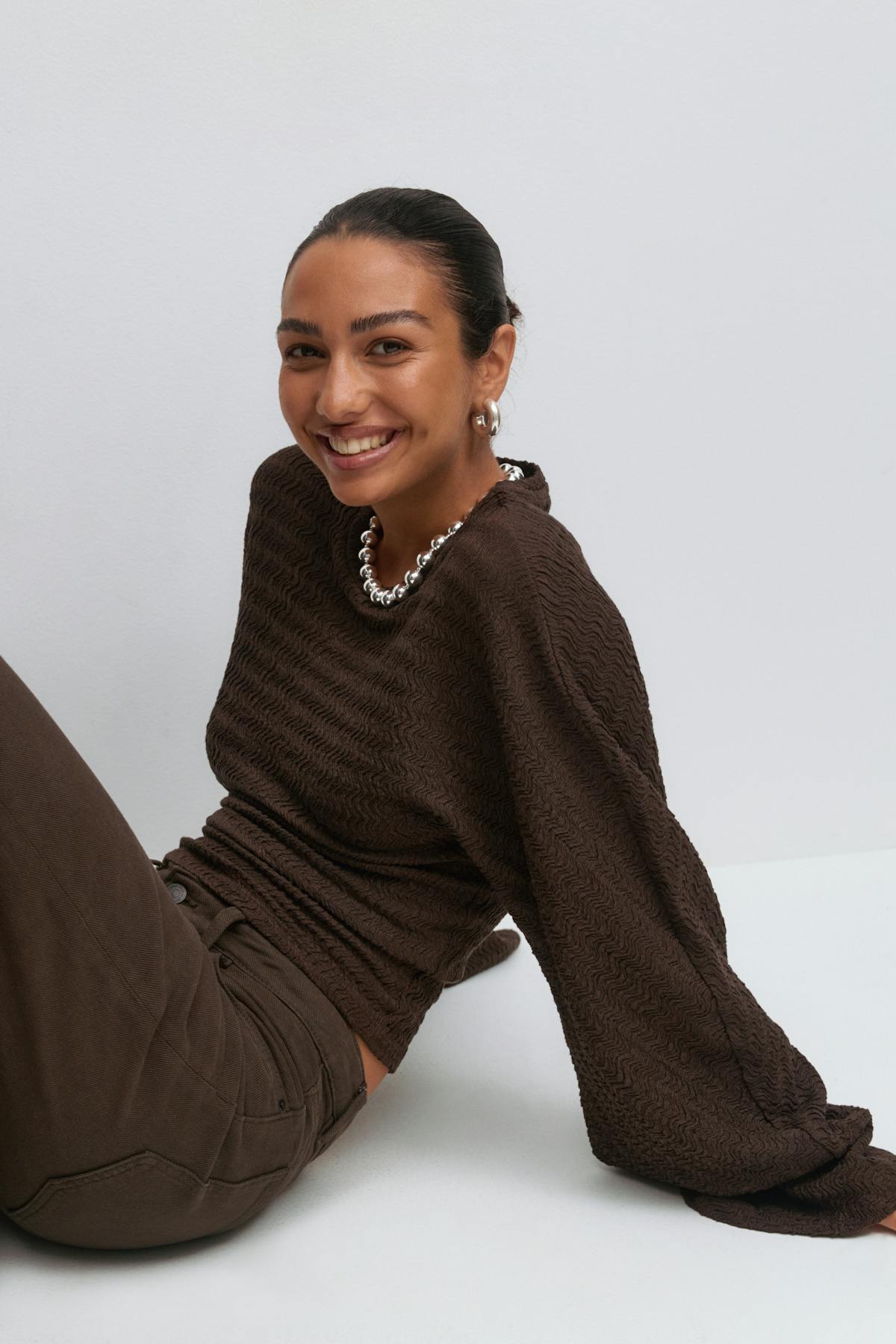Textured wide sleeve top