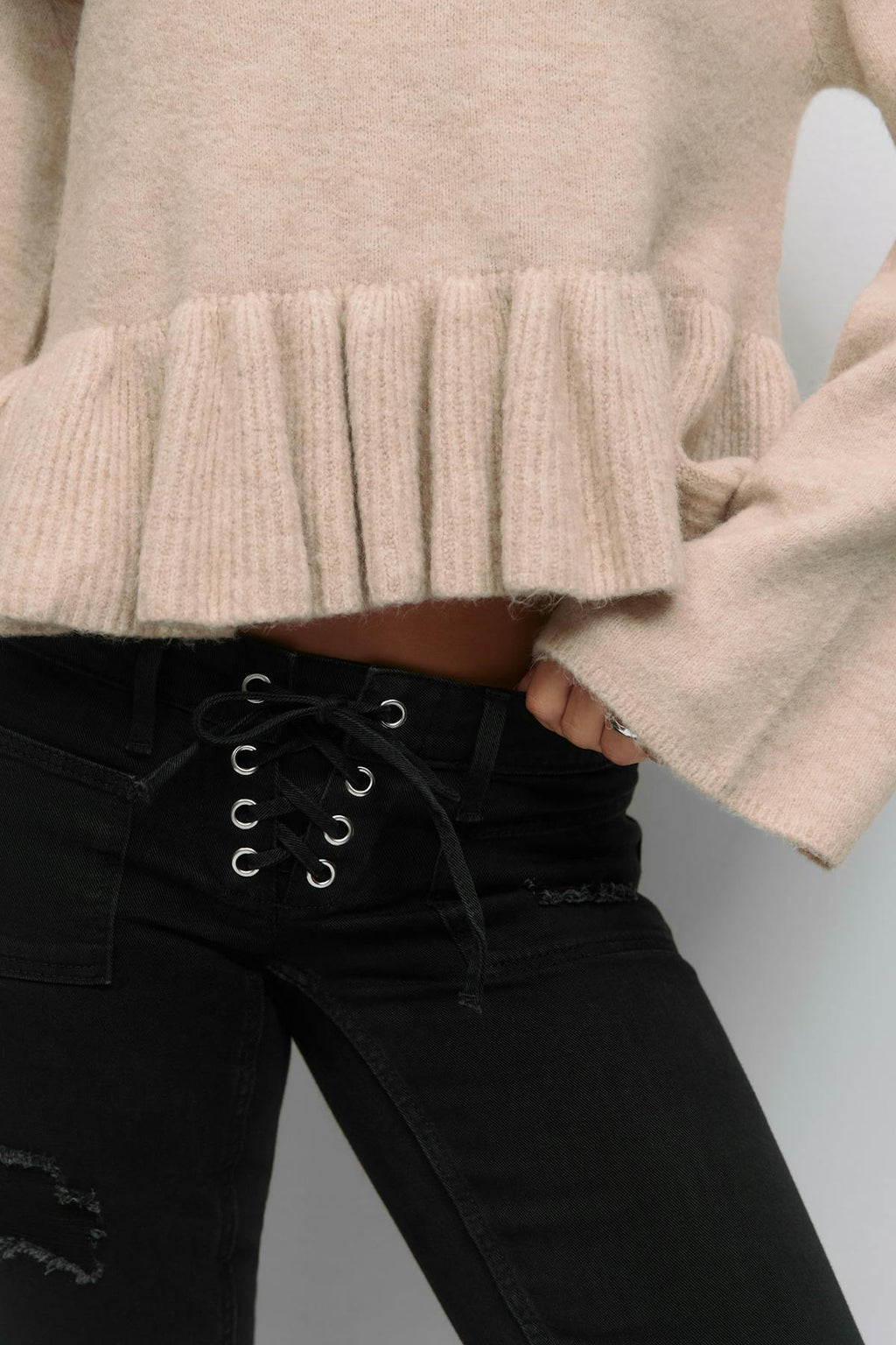 14+ knitted peplum sweater
