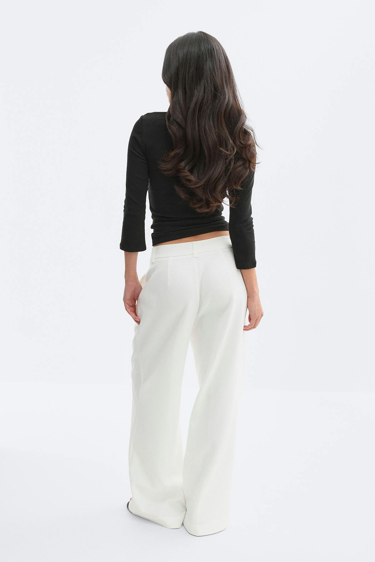 Mid waist pleated trousers