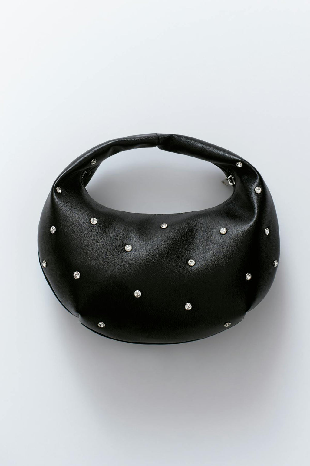 Soft round studded handbag