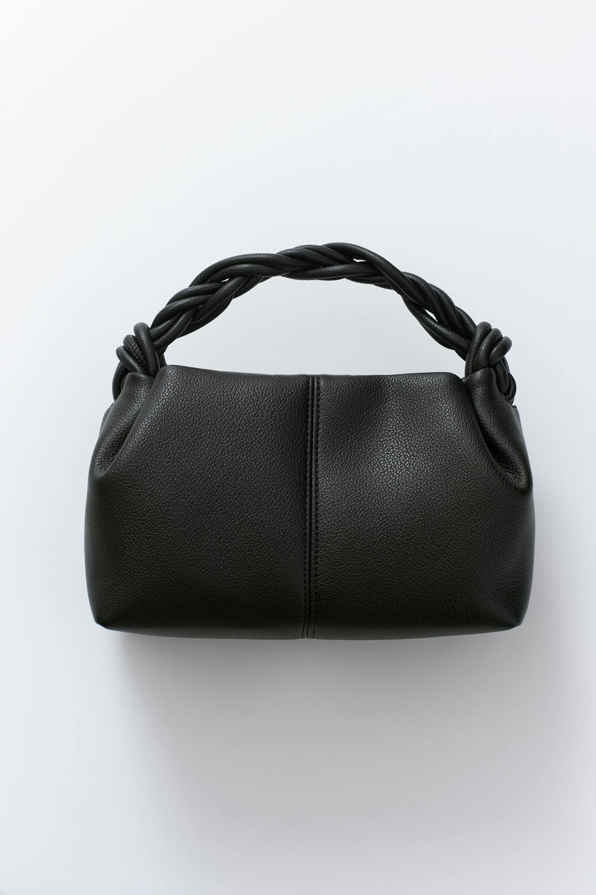Small braided top handle bag
