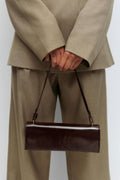 Small patent shoulder bag