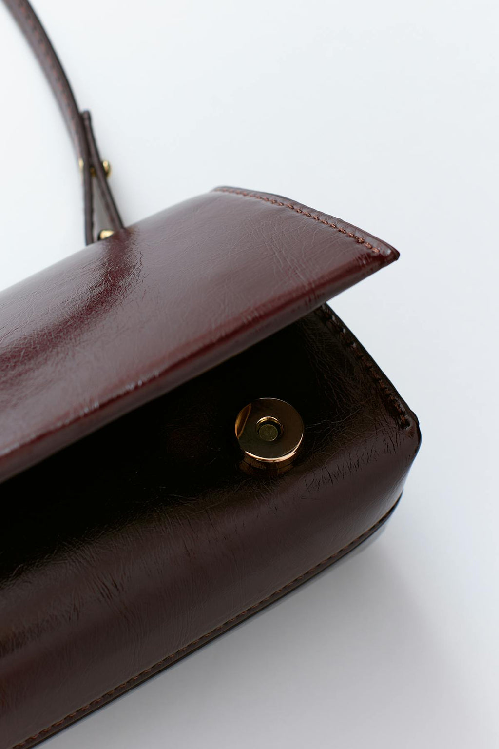 Small patent shoulder bag