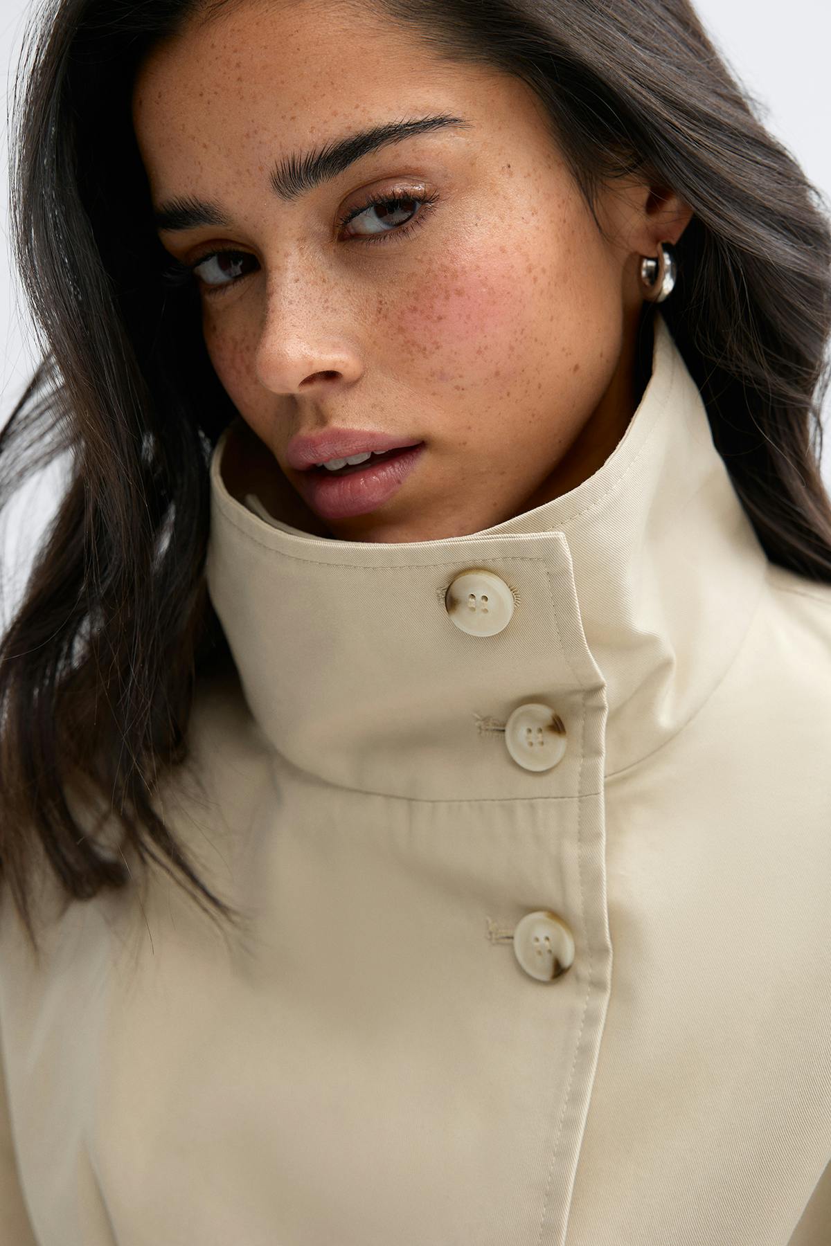 Short cape trench jacket