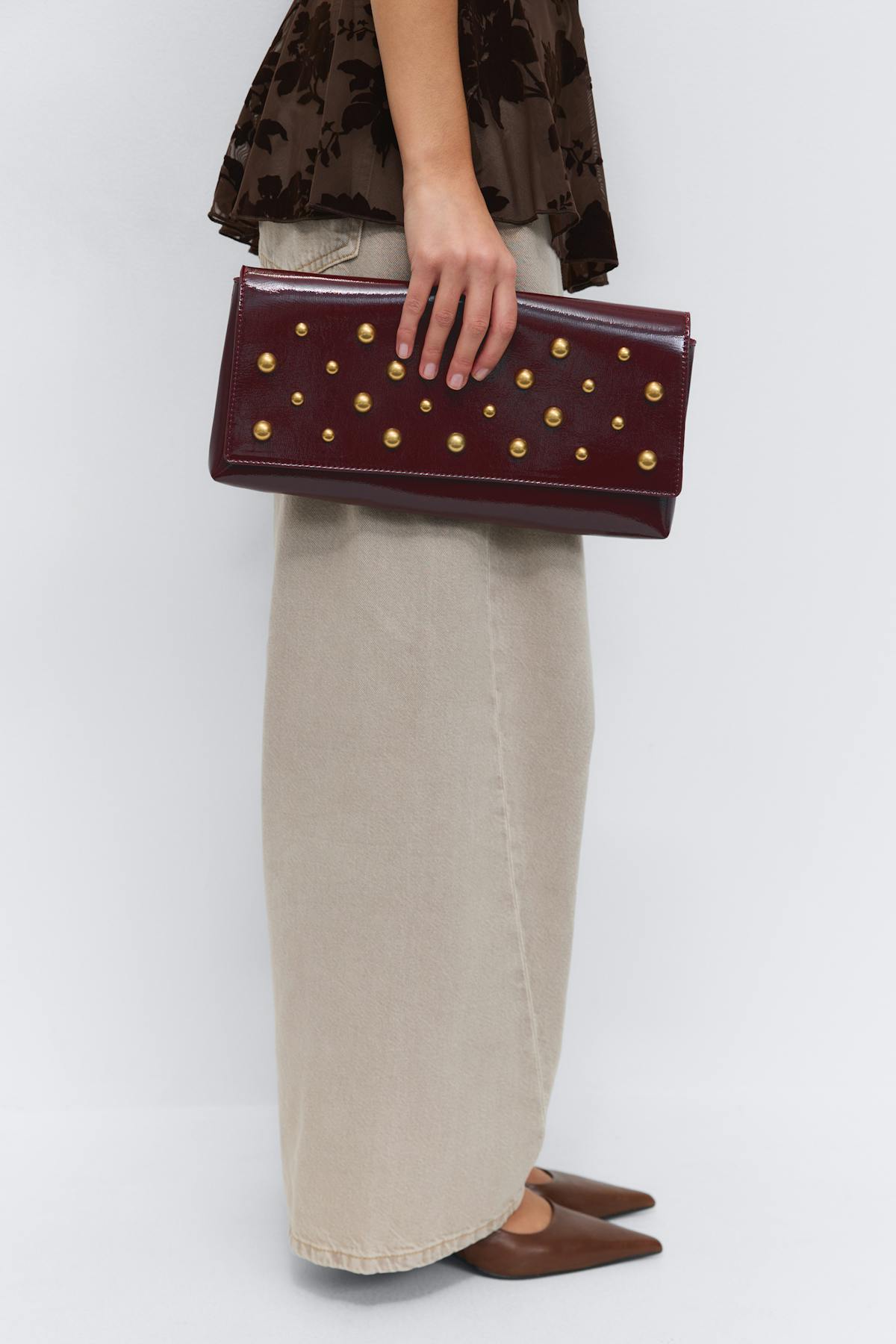 Patent studded clutch