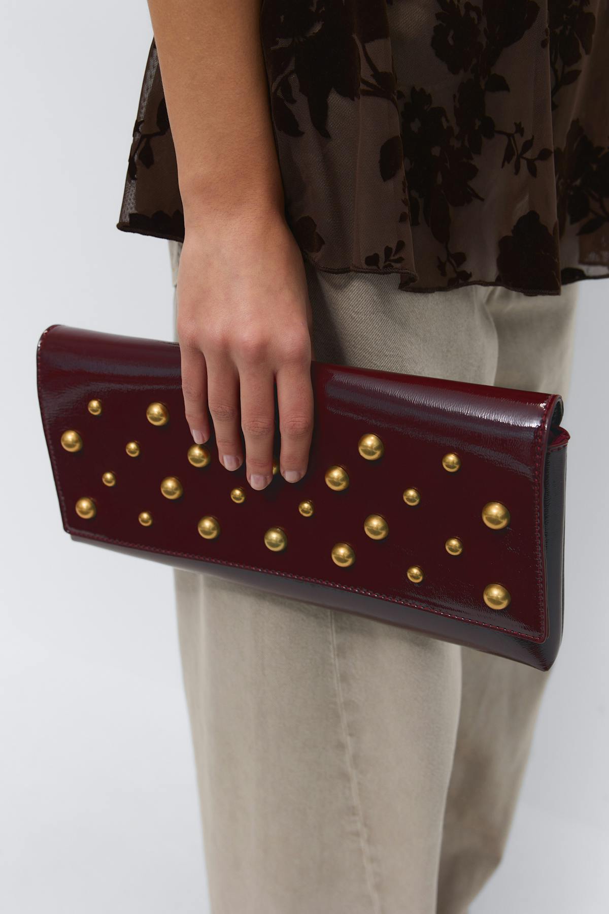 Patent studded clutch