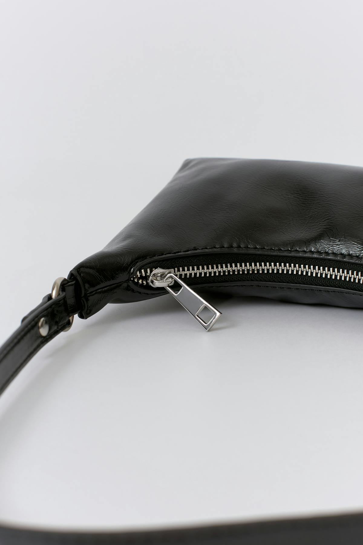 Patent shoulder bag