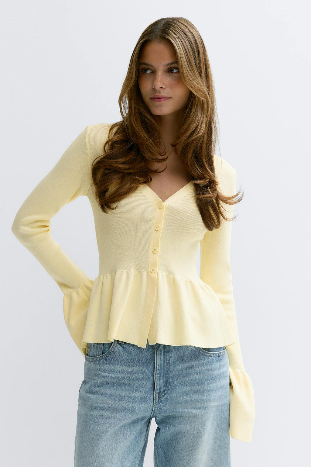 Knitted peplum cardigan