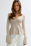 Knitted peplum cardigan