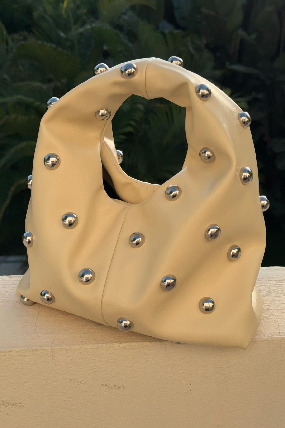 Studded handbag
