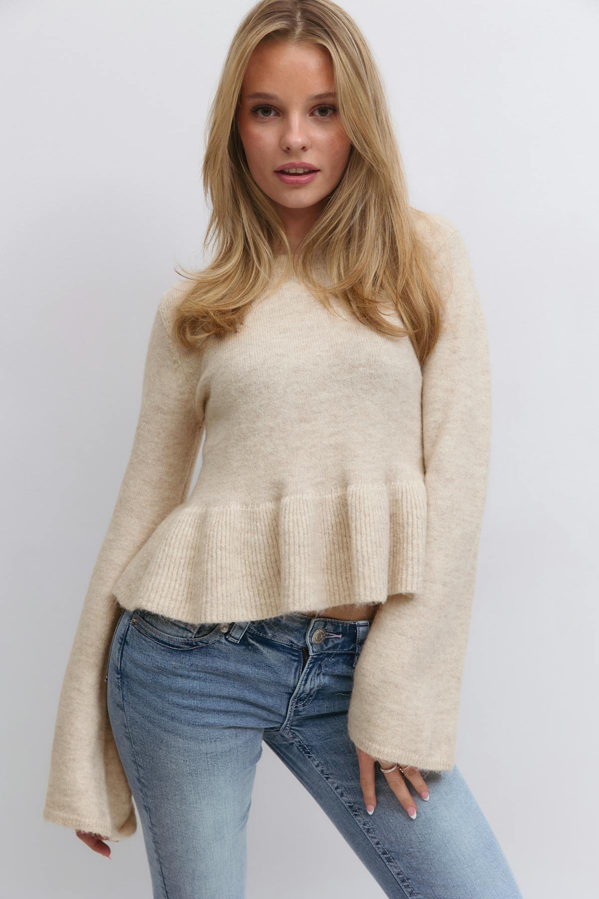 Y knitted peplum sweater