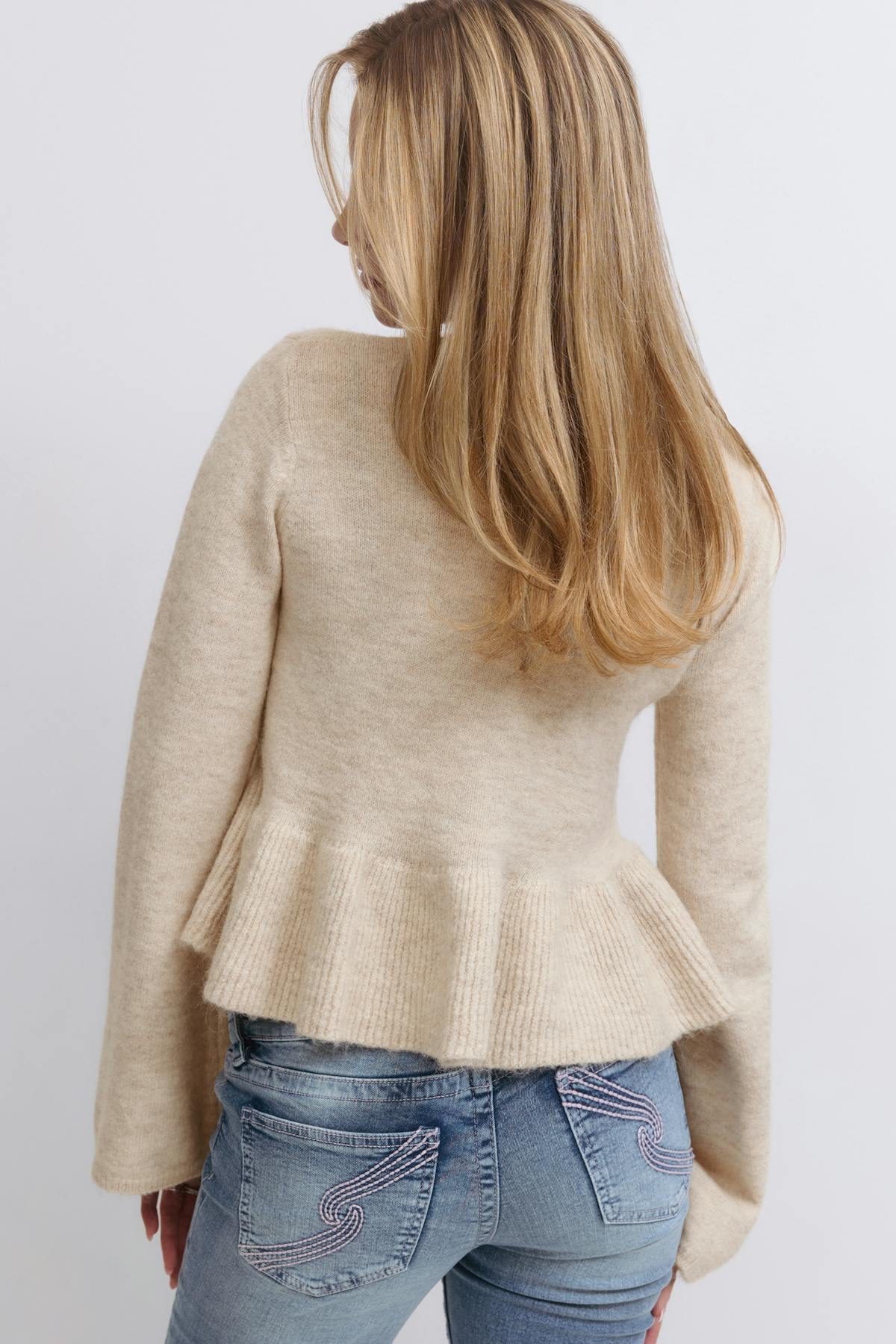 Y knitted peplum sweater