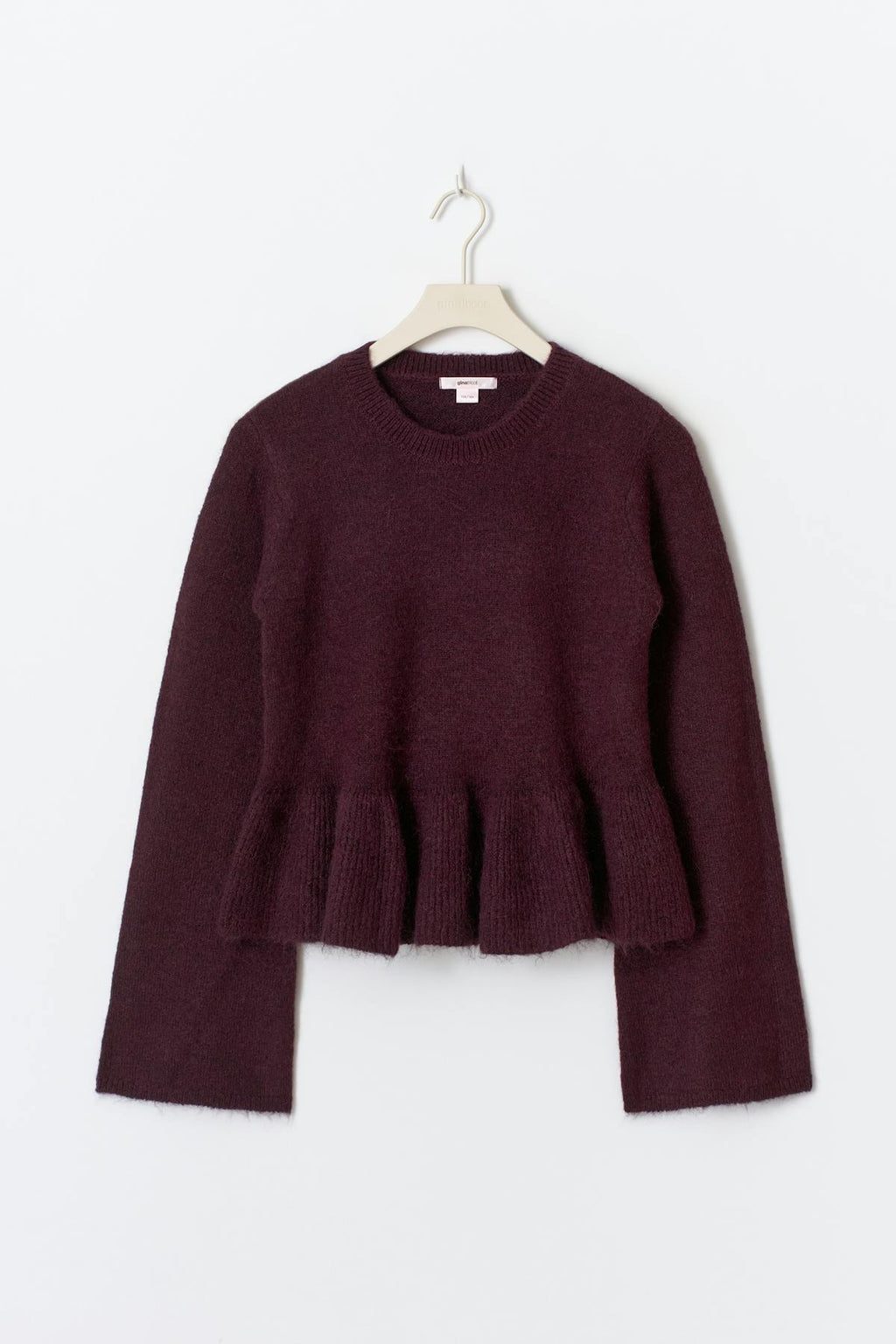 Y knitted peplum sweater