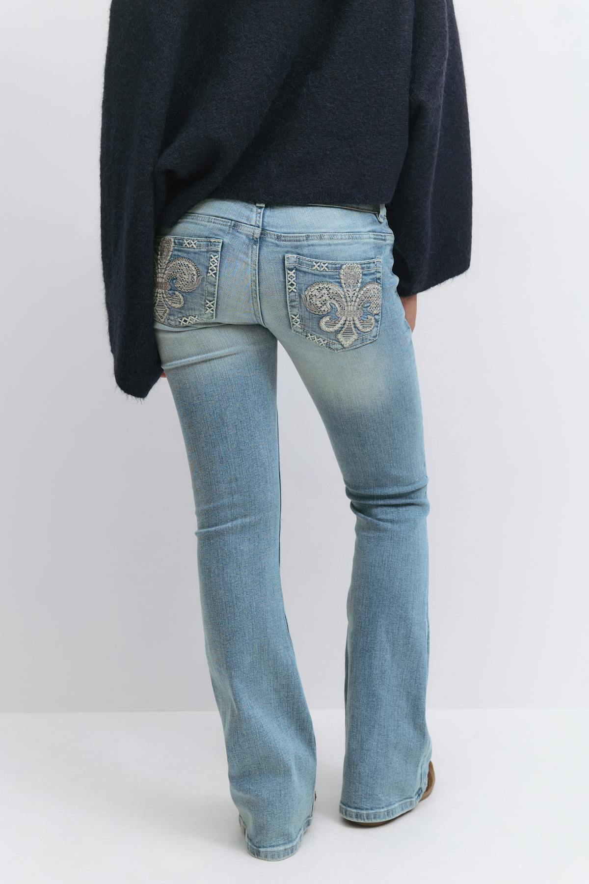 Y pleated flare jeans