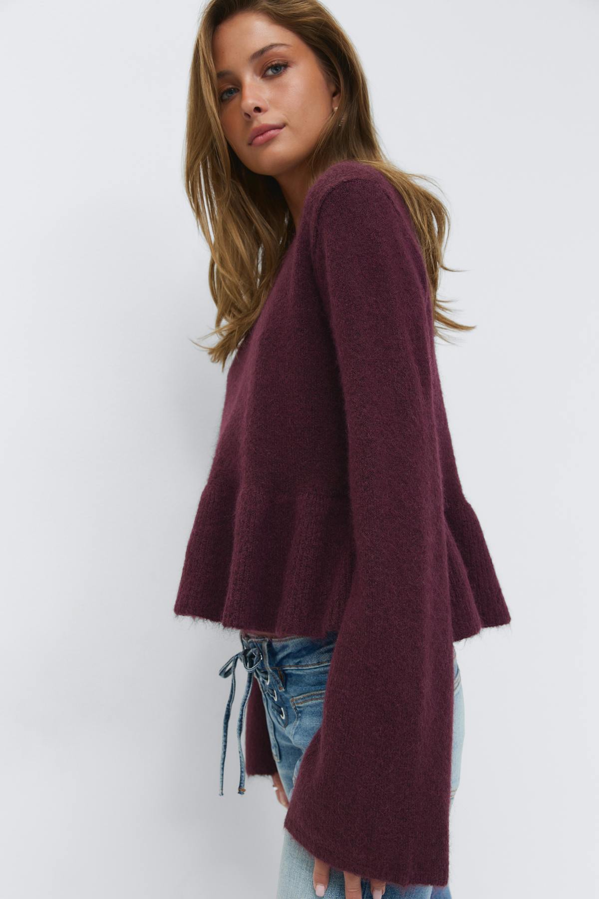 14+ knitted peplum sweater