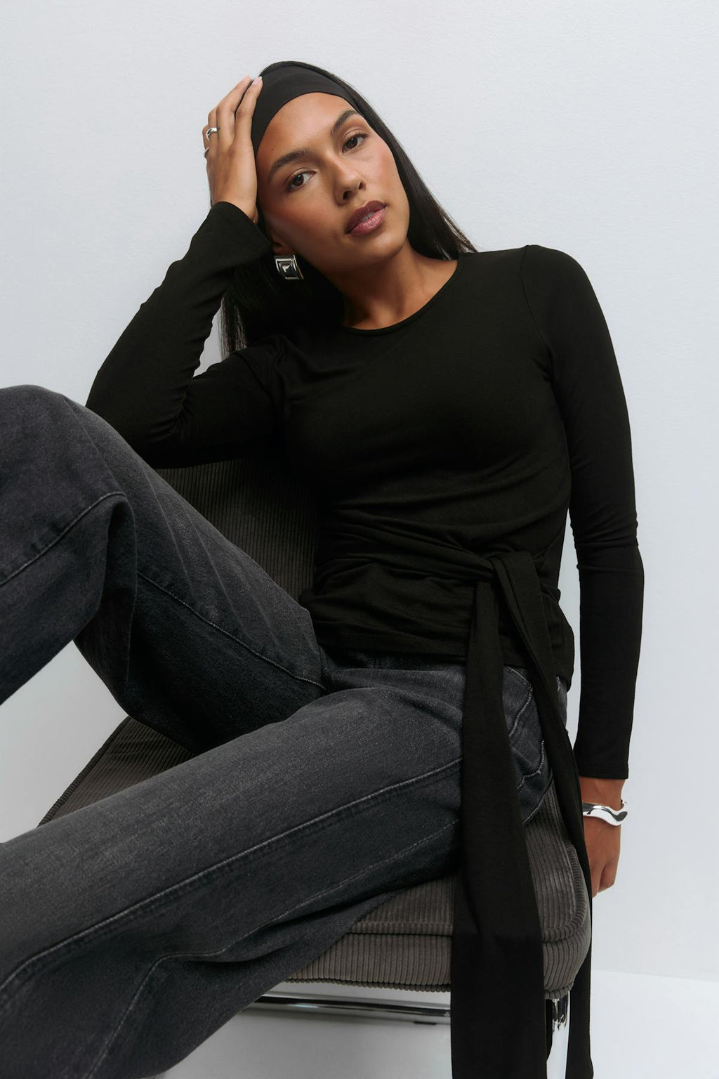 Asymmetric tie top