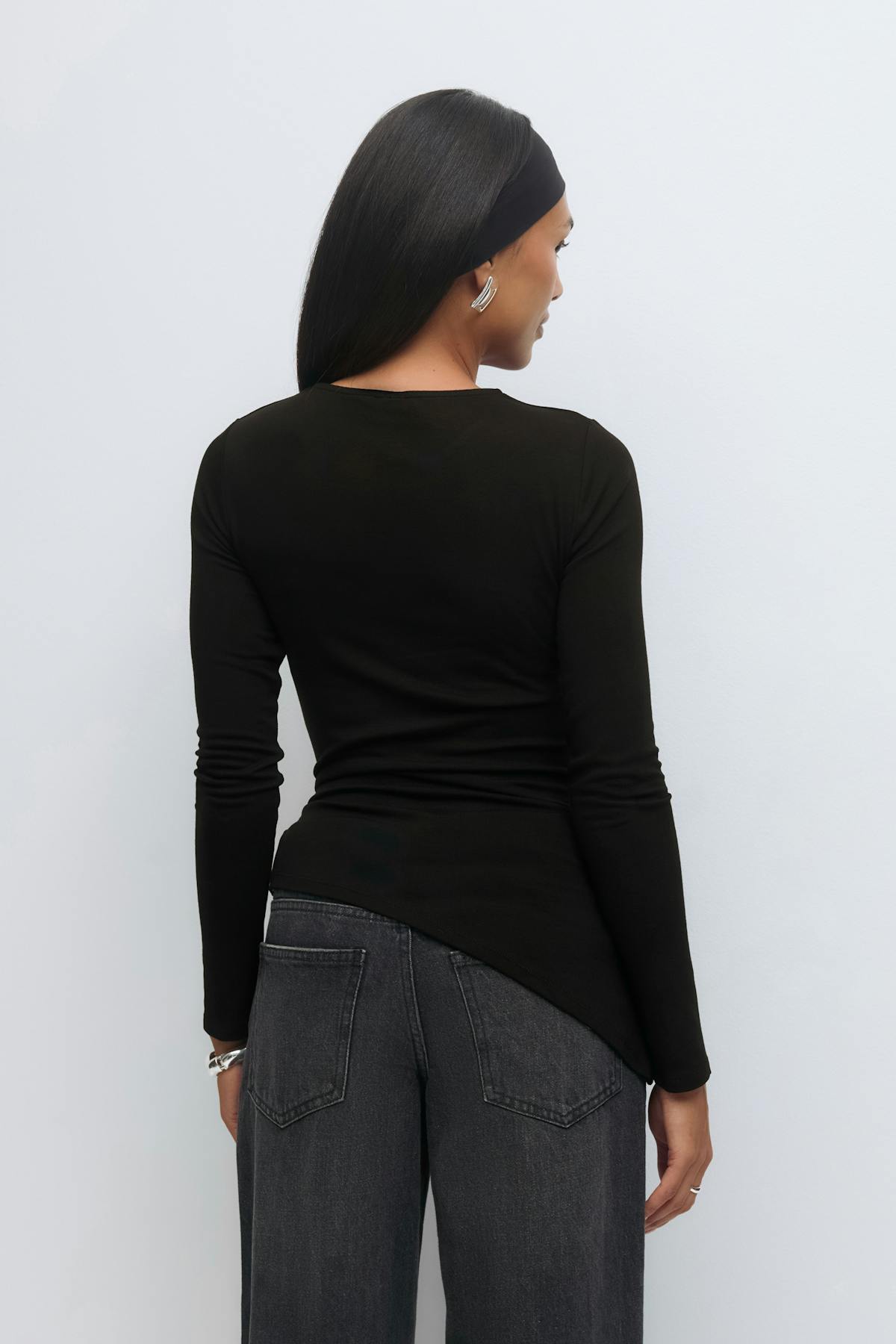 Asymmetric tie top