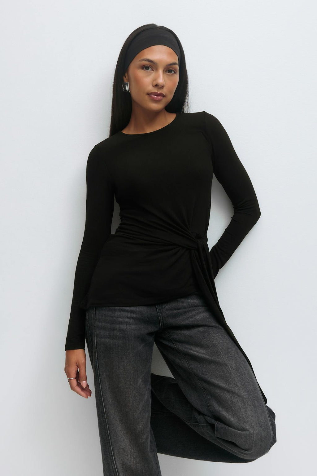 Asymmetric tie top