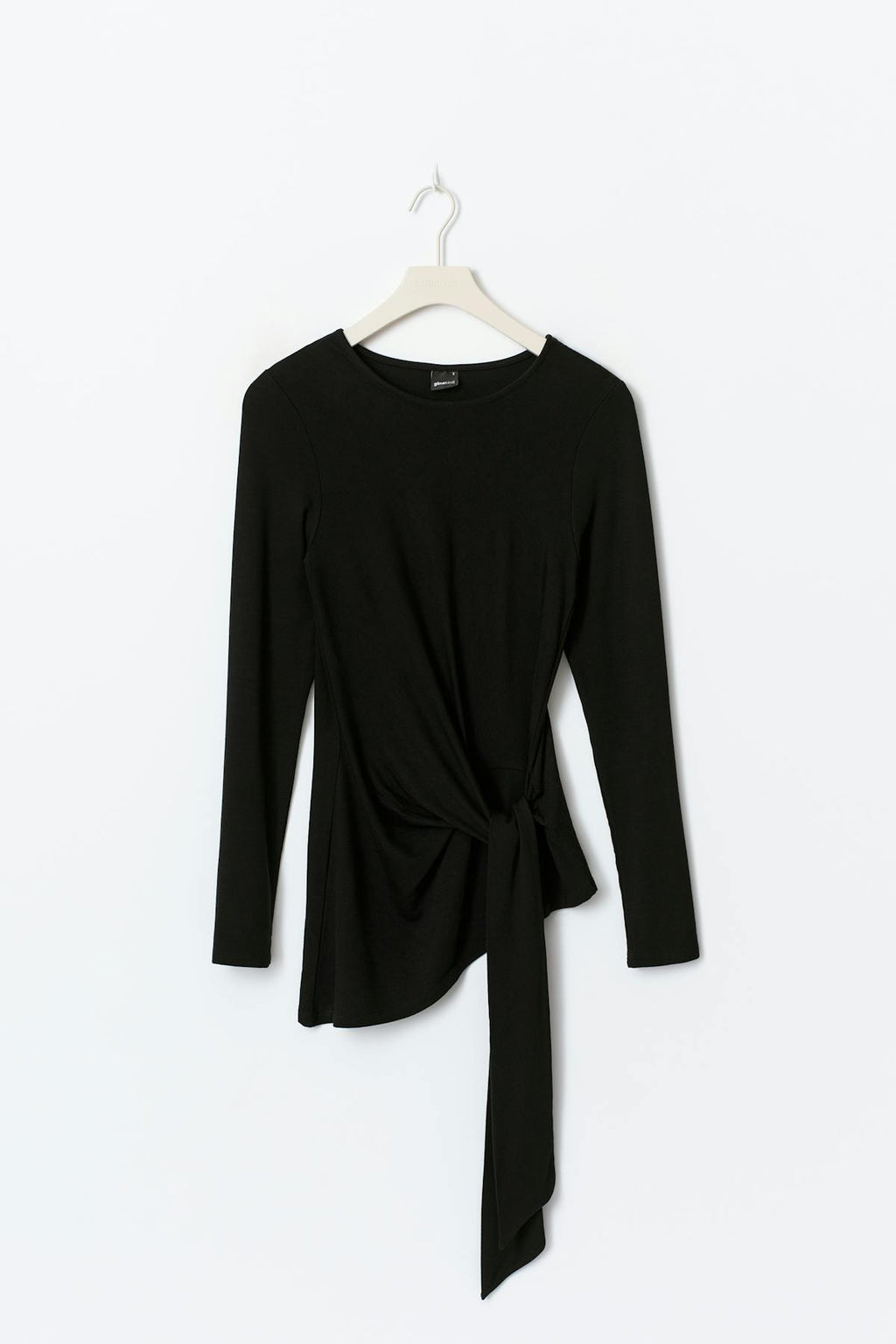 Asymmetric tie top