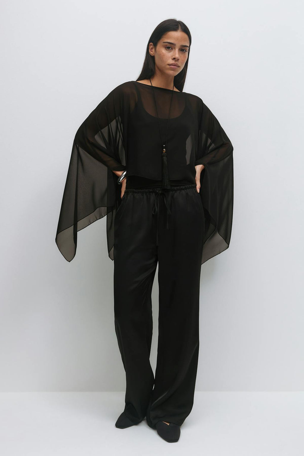 Sheer asymmetric poncho