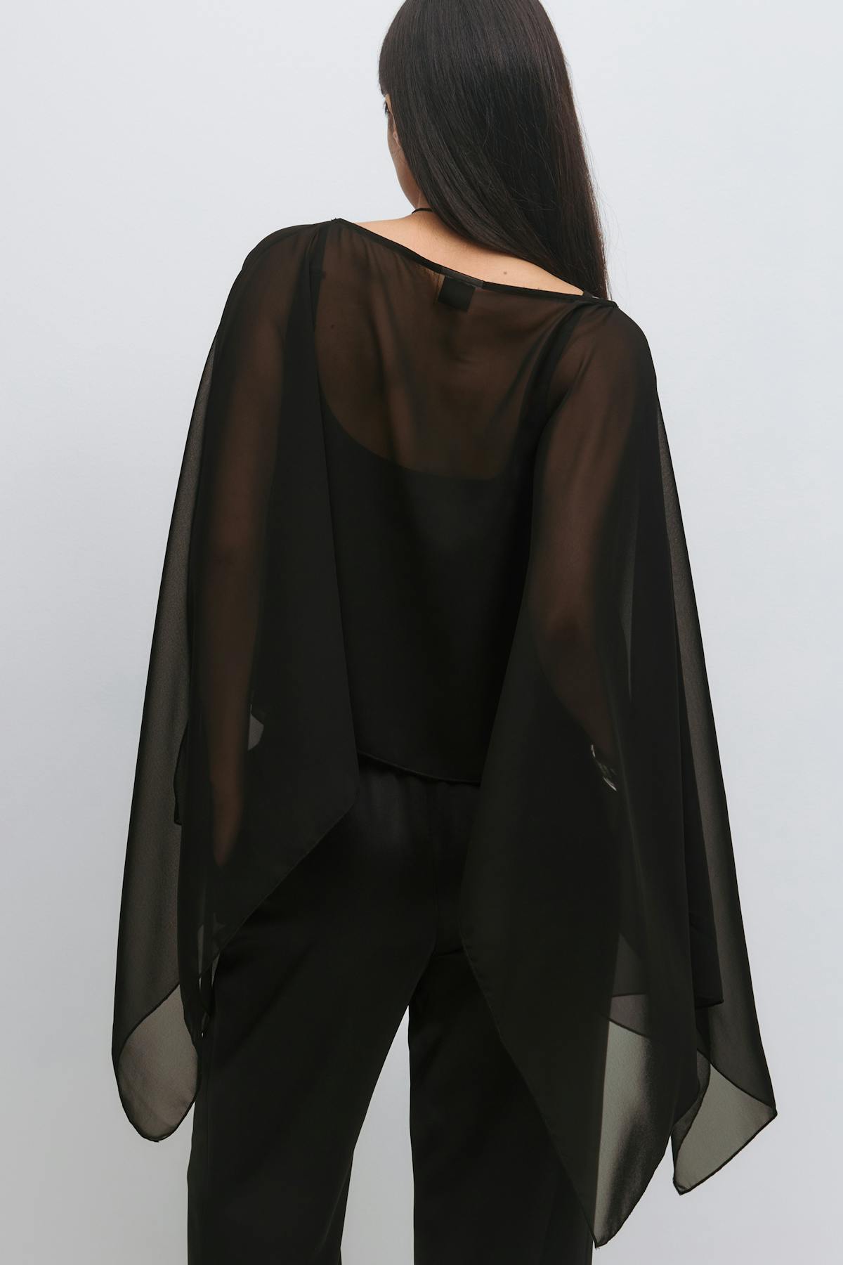 Sheer asymmetric poncho