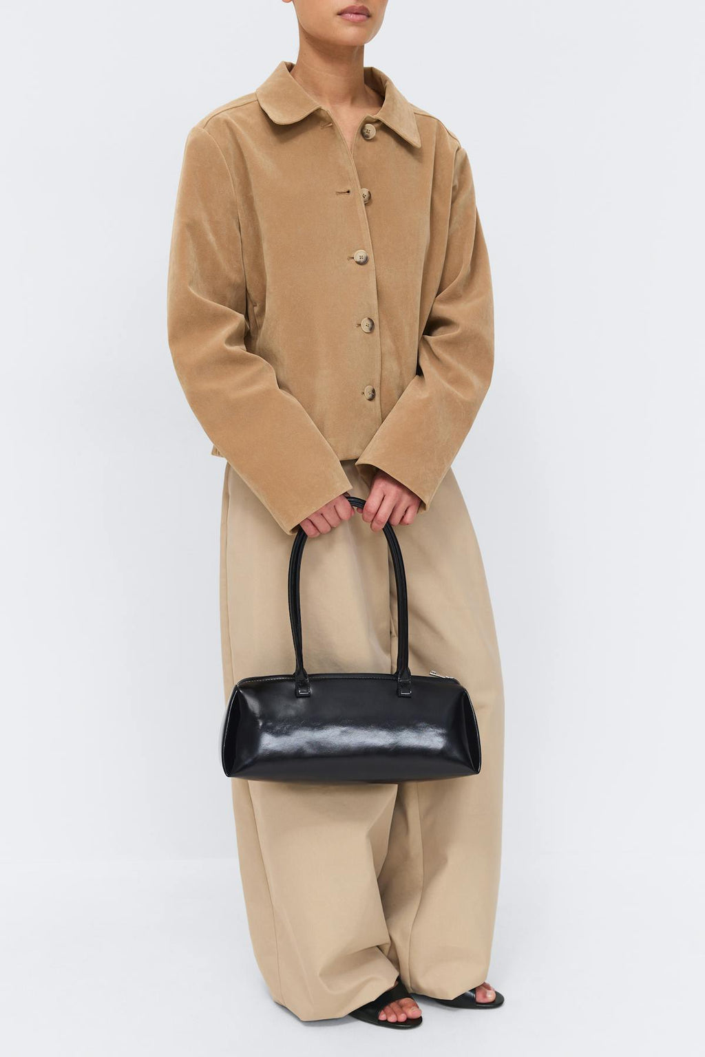 Patent shoulder bag