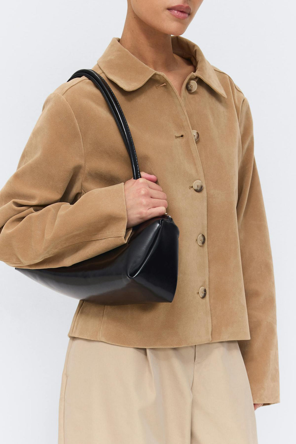 Patent shoulder bag