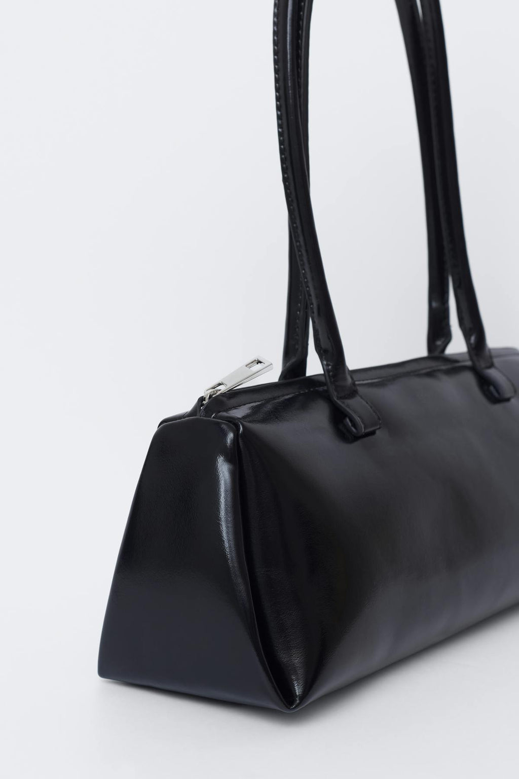 Patent shoulder bag
