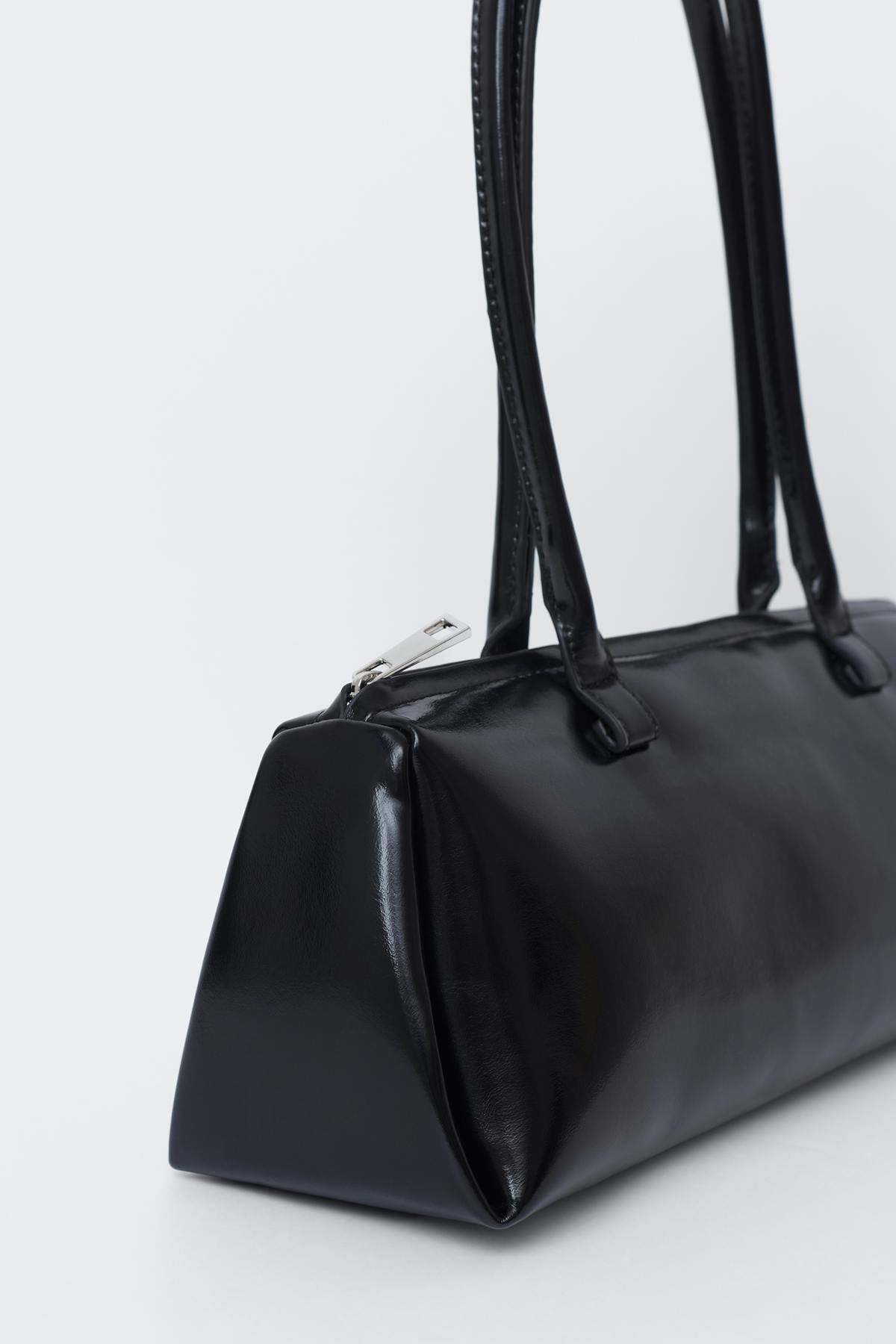 Patent shoulder bag