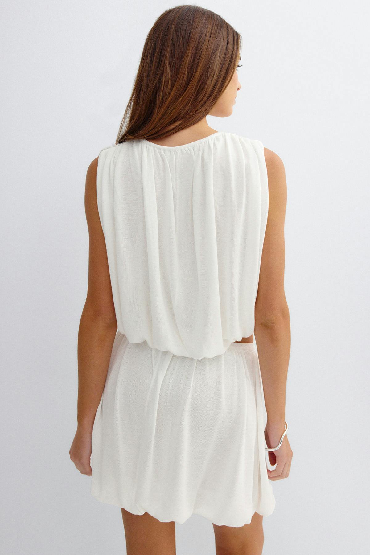 Bubble hem knitted top