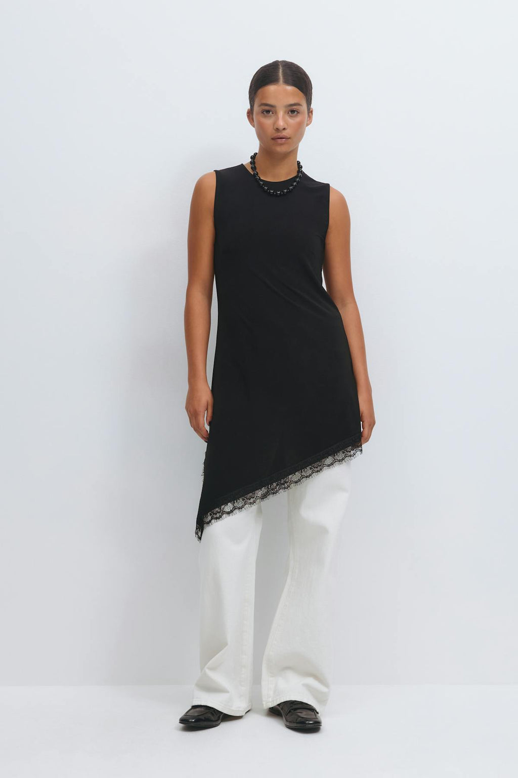 Asymmetric lace detail tunic