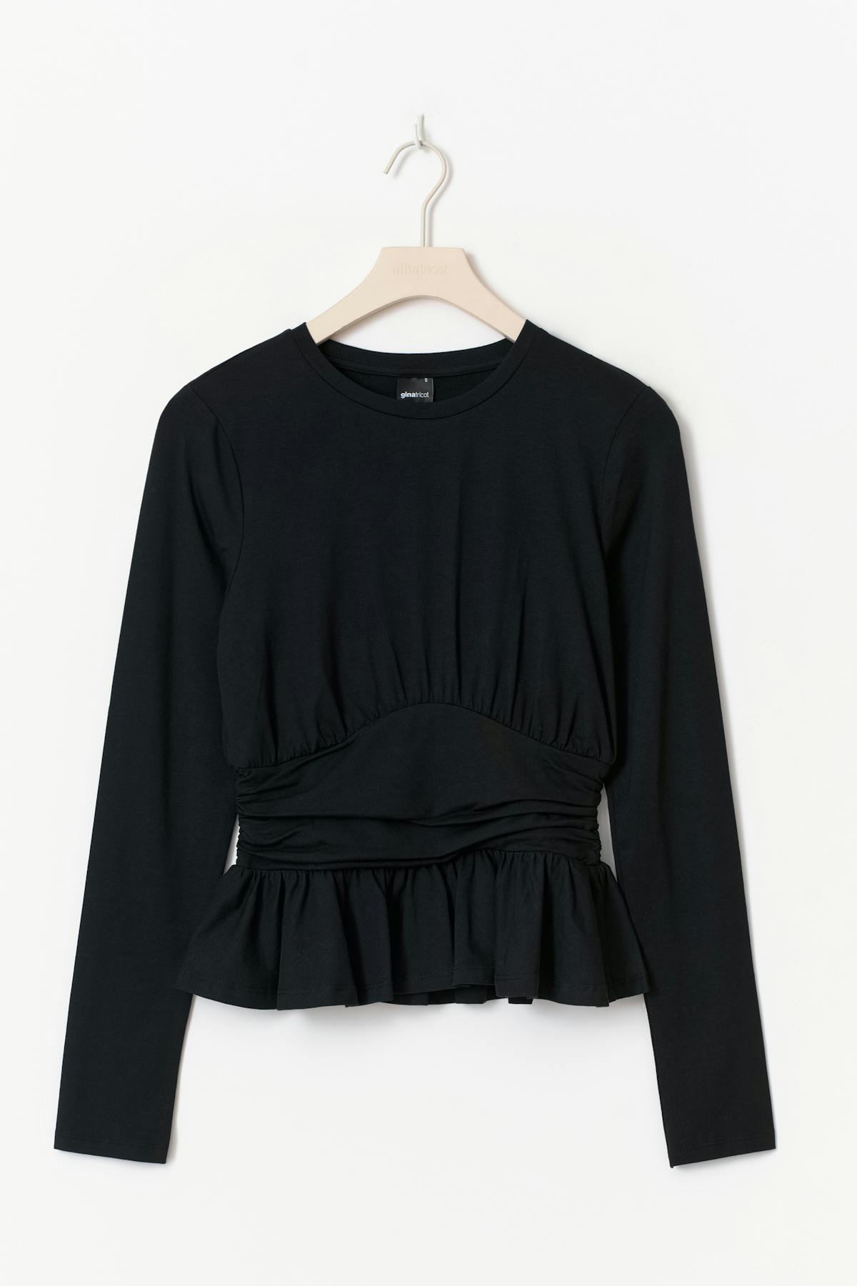 Long sleeve peplum top