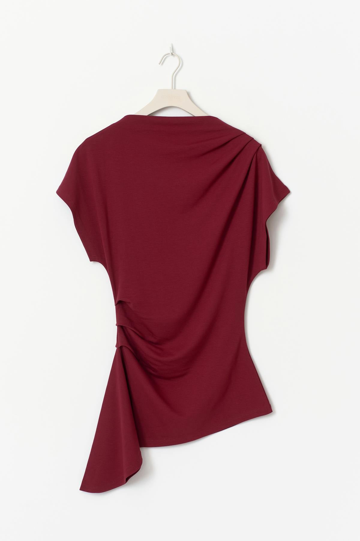 Asymmetric funnel neck top