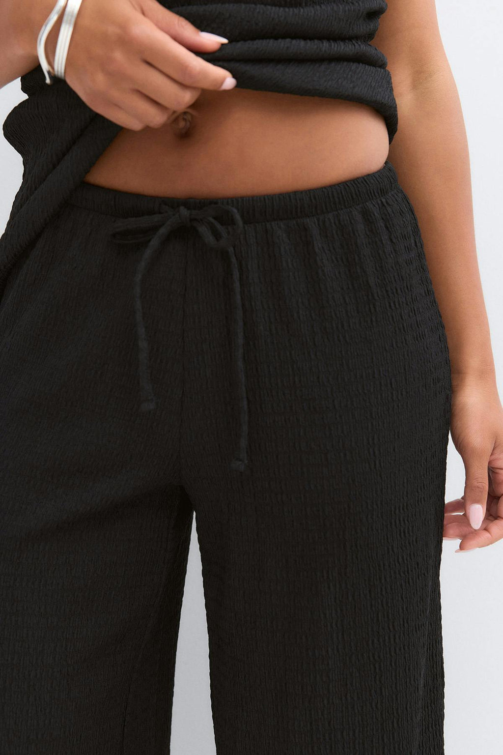 Textured wide trousers