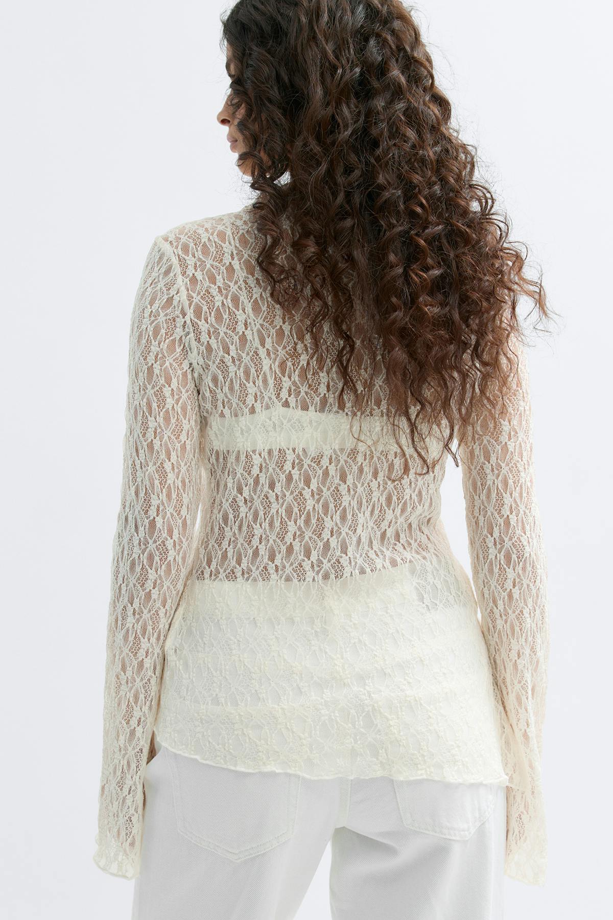 Asymmetric lace top
