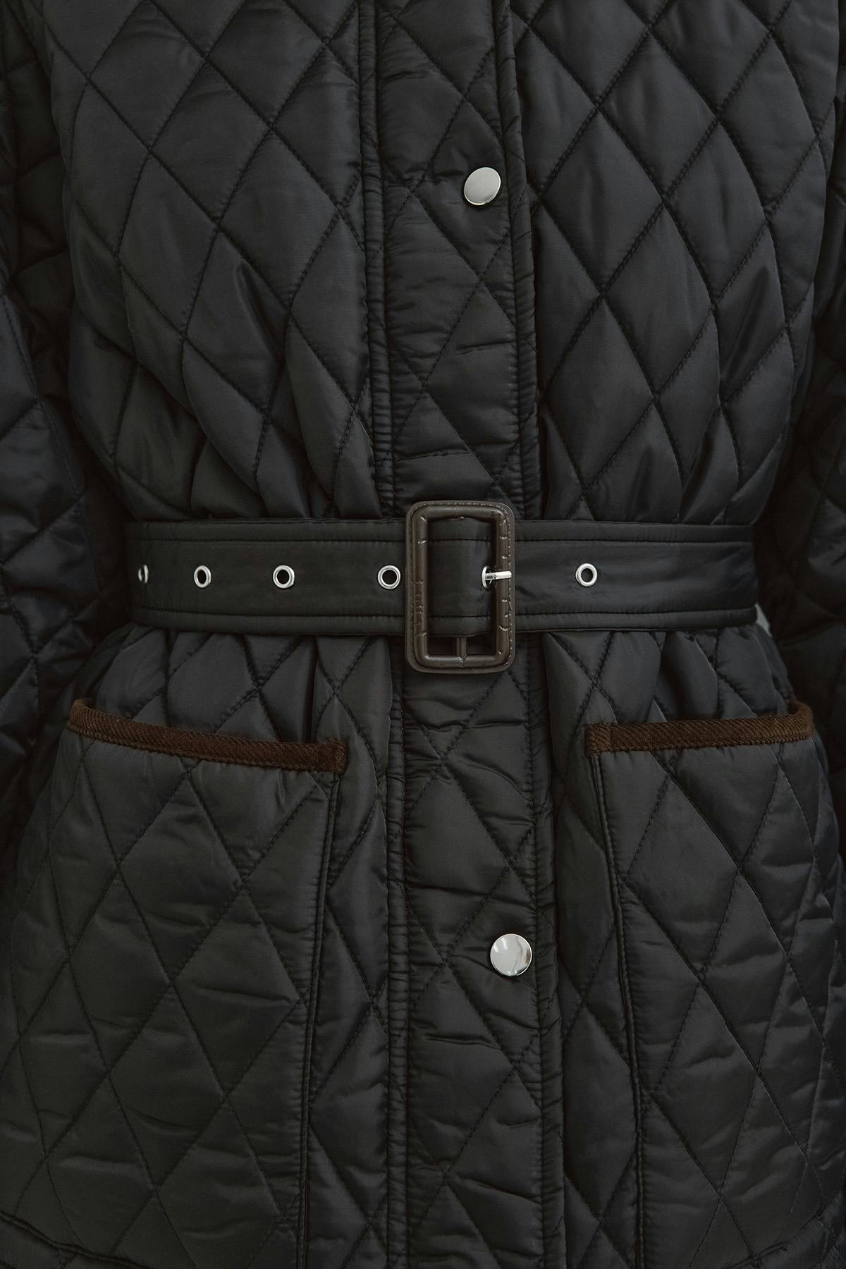 Quilted belted jacket