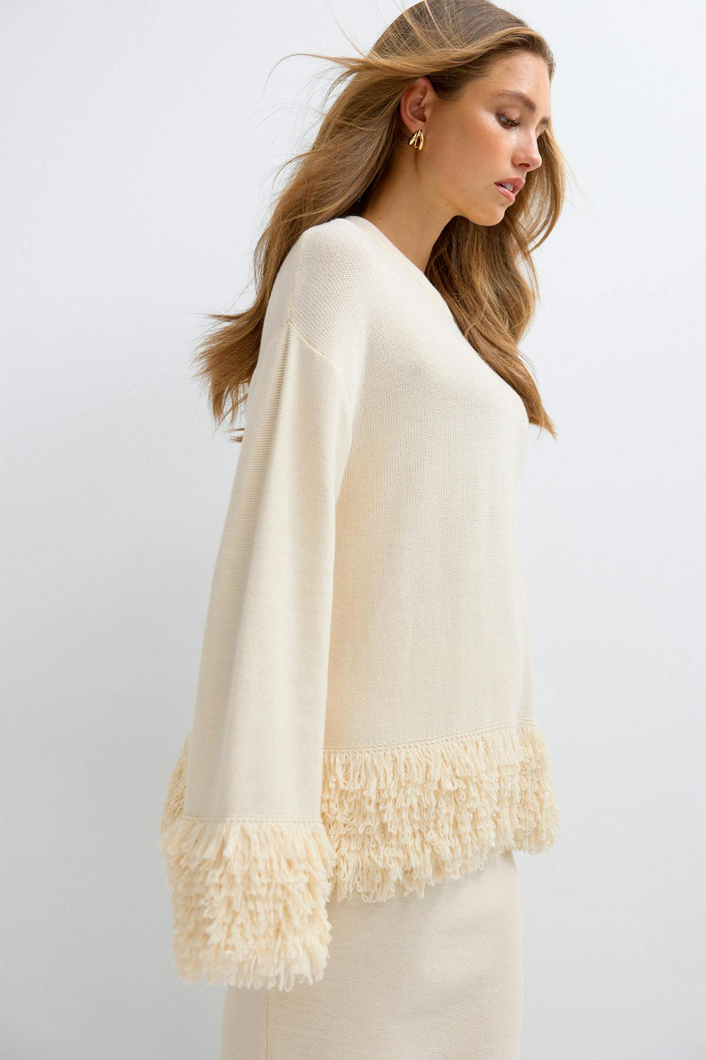 Knitted fringe sweater