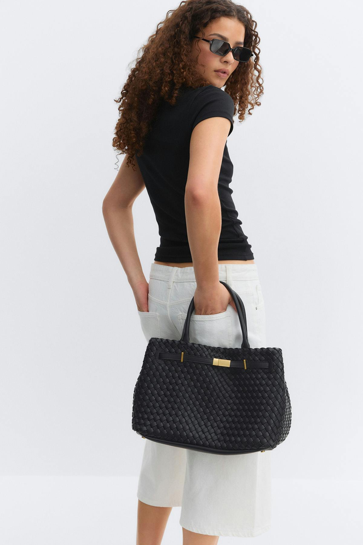 Braided top handle bag