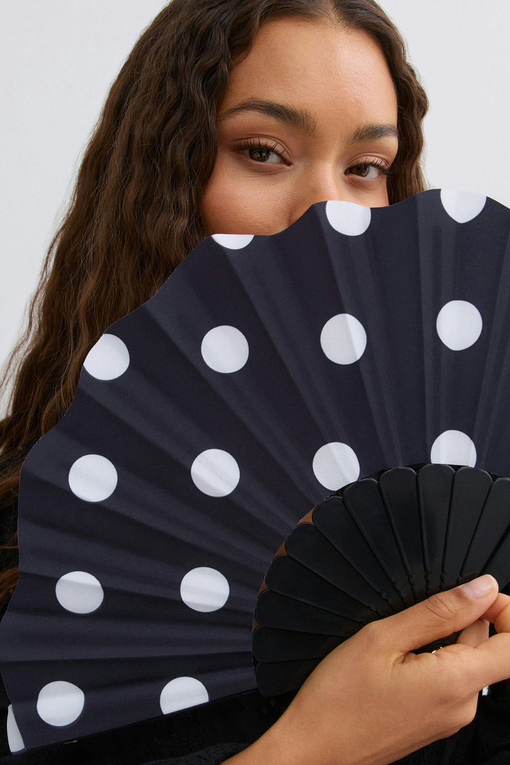 Folding hand fan