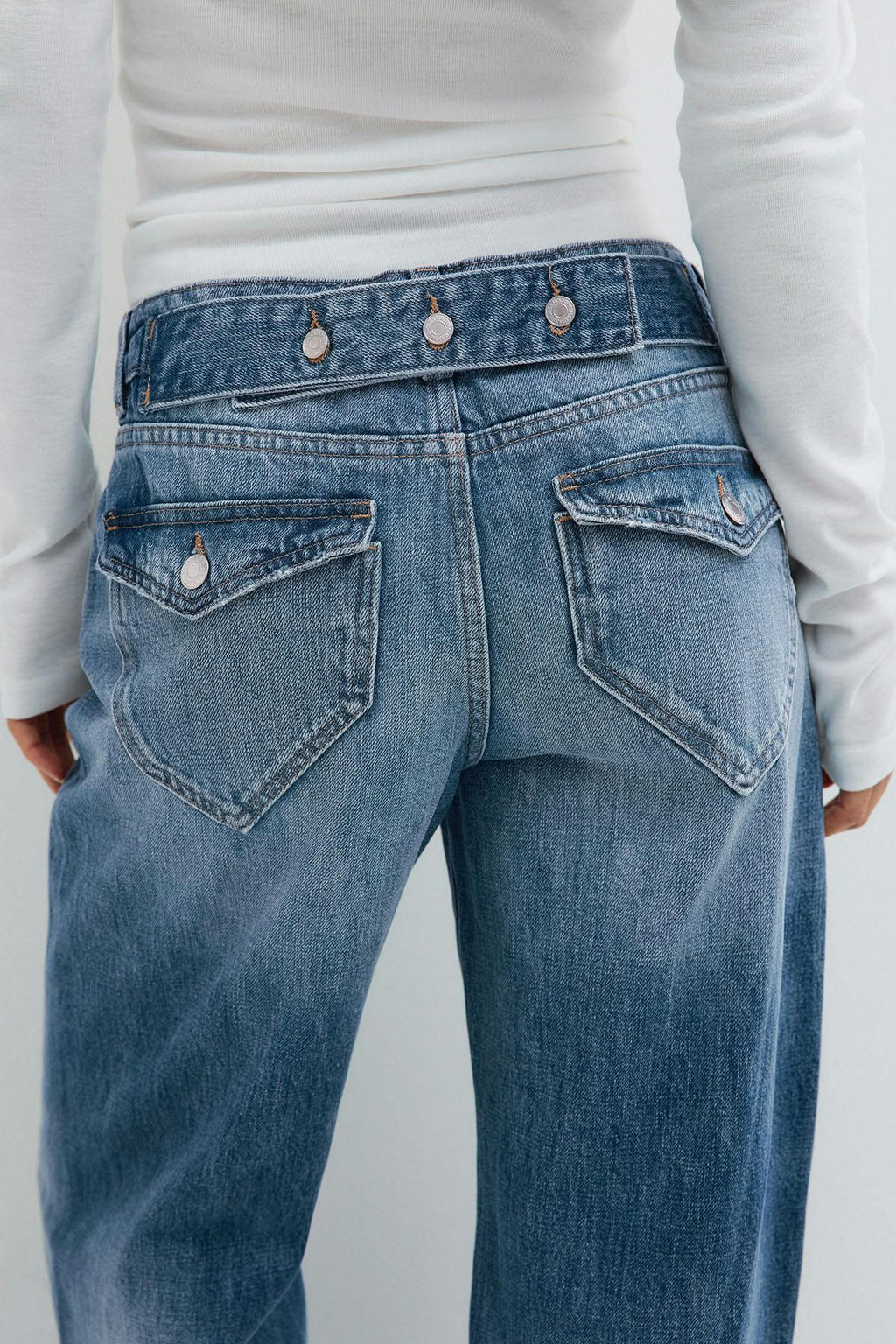 Button snap back jeans