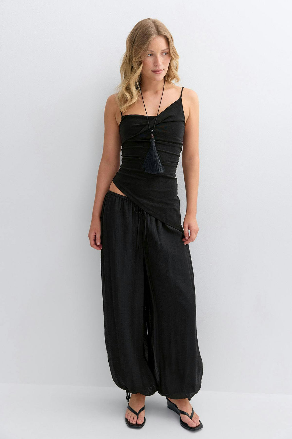Asymmetric ruched singlet