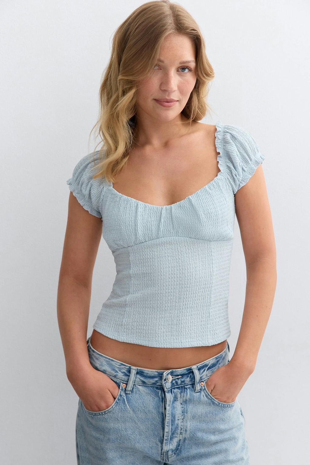 Textured puff sleeve top