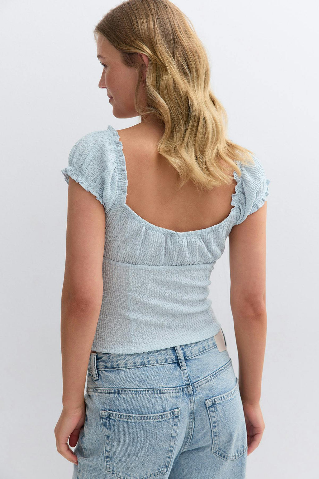 Textured puff sleeve top