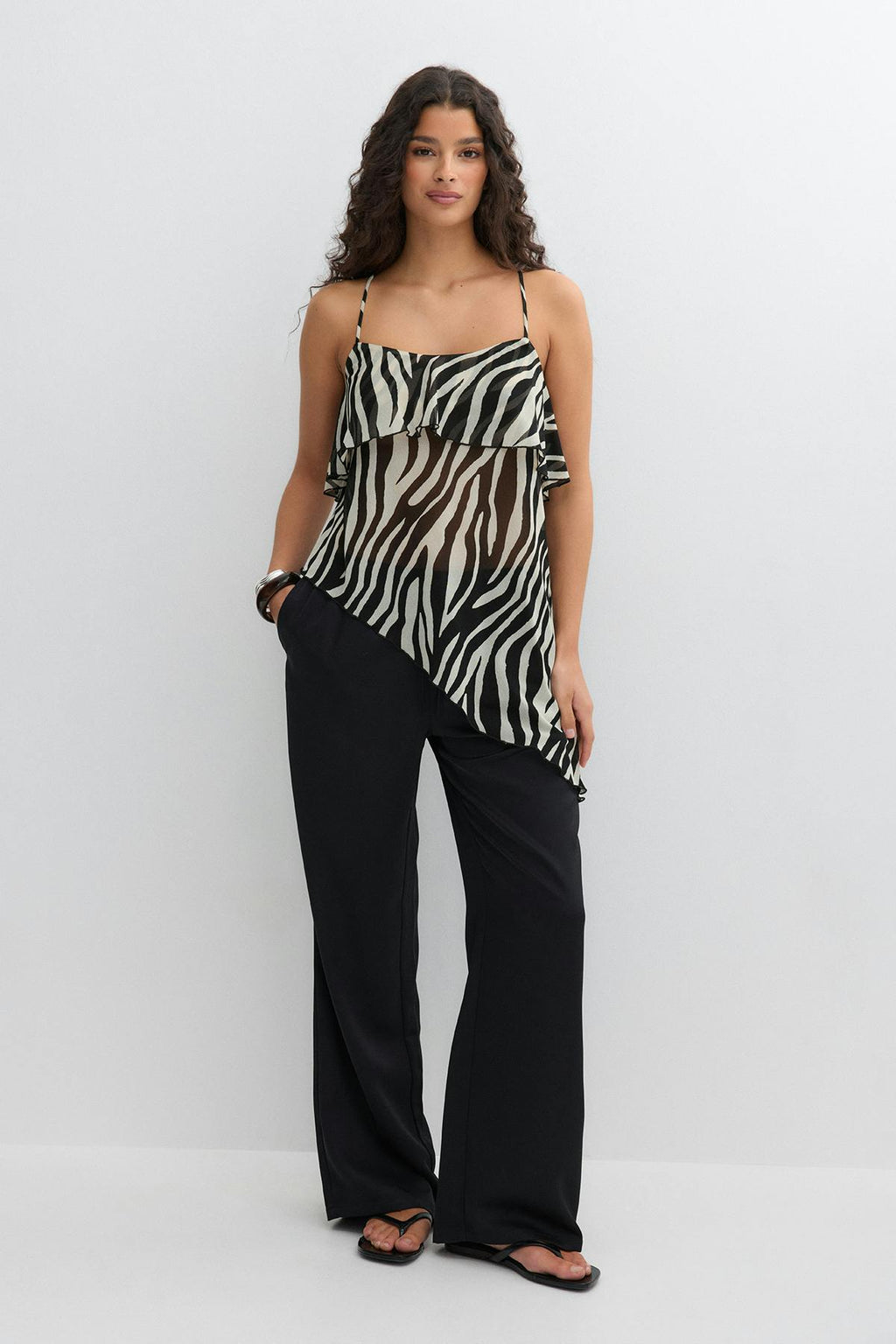 Asymmetric frill singlet