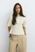 Shaped knitted top