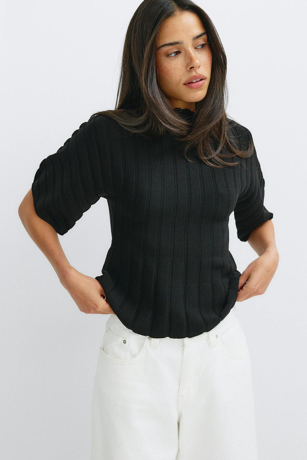 Shaped knitted top