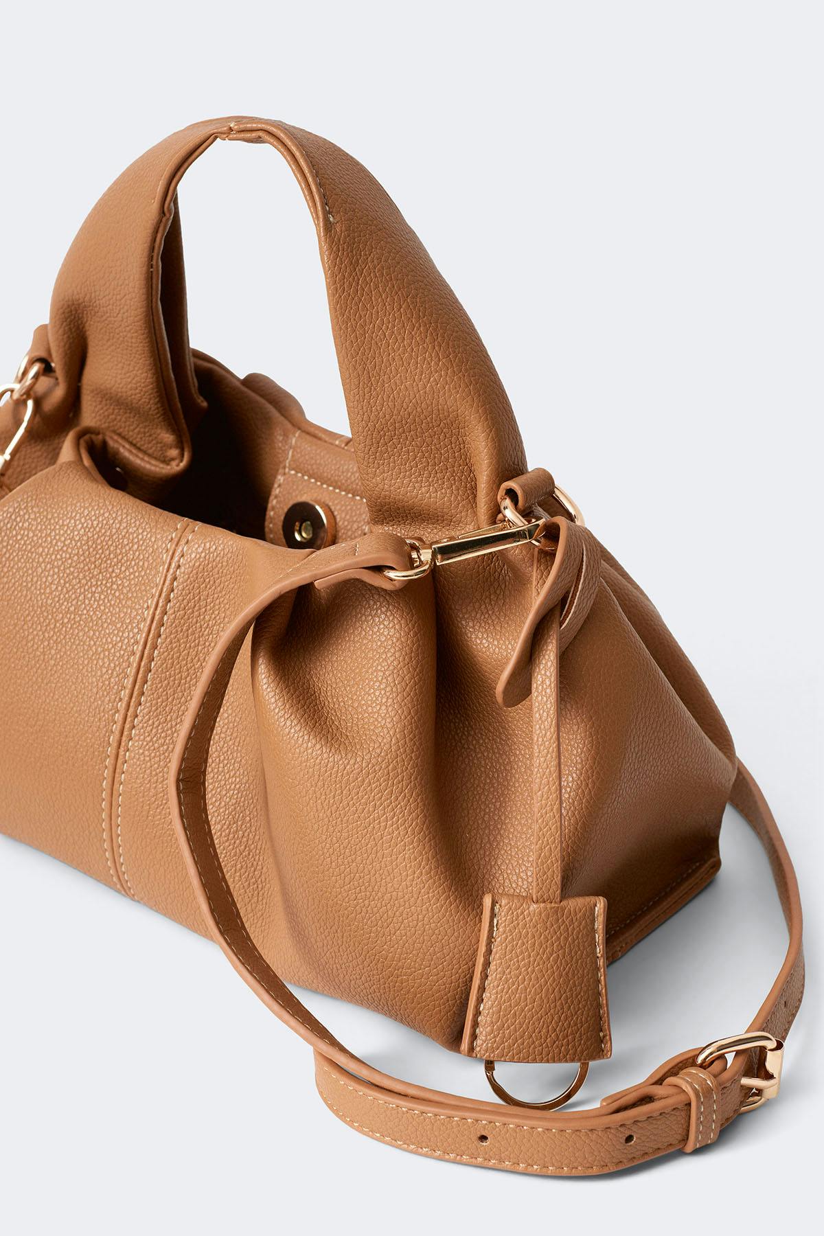 Braided top handle bag