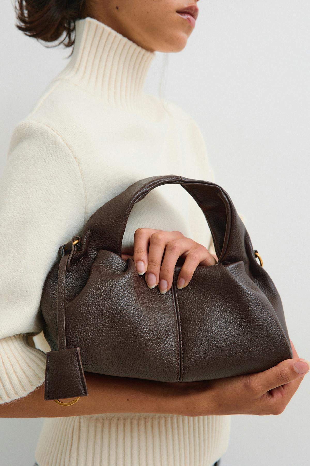 Braided top handle bag