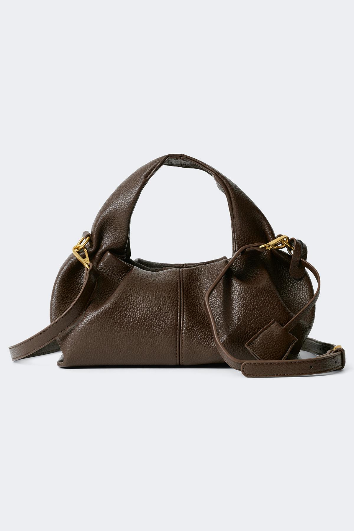 Braided top handle bag